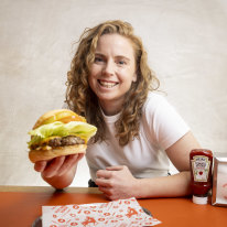 Bronwyn with her beloved cheeseburger at Butcher’s Diner.