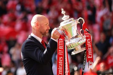 Erik ten Hag, Manager of Manchester United celebrates with the trophy during the Emirates FA Cup Final match between Manchester City and Manchester United at Wembley Stadium on May 25, 2024 in London, England. (Photo by Alex Pantling/Getty Images )