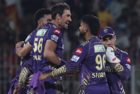 Mitchell Starc celebrates the wicket of  Abhishek Sharma.