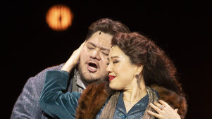 Diego Torre, playing the role of Cavaradossi, and Karah Son, playing the role of Tosca.