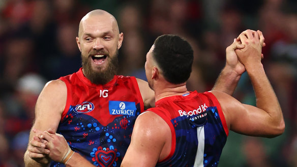 Steven May and Max Gawn celebrate a goal for the Demons.