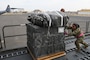 A U.S. Air Force port operations Airman loads pallets of humanitarian aid destined for Gaza aboard a C-130J Super Hercules at an undisclosed location within the U.S. Central Command area of responsibility, April 28, 2024. The U.S. Air Force’s rapid global mobility capability is enabling the expedited movement of critical, life-saving supplies to Gaza. (U.S. Air Force photo)