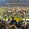 Fans invaded the pitch on the final whistle in Gosford.