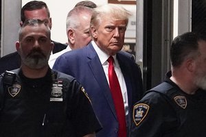 Former President Donald Trump is escorted to a courtroom, April 4, 2023, in New York