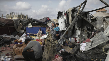 The remnants ofatent city in Rafah set alight by an Israeli airstrike, burning its inhabitants to death.