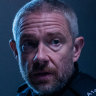 Martin Freeman as troubled Liverpool police officer Chris Carson.