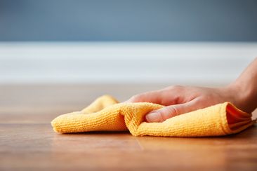 Cleaning a surface with a cloth, dusting, microfibre cloth