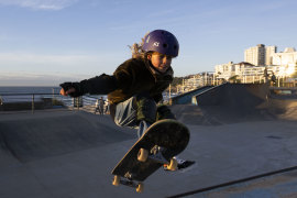 Mila McDonald, 9, doing an air out at Bondi Skate Park.