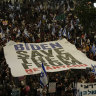 People protest against Israeli Prime Minister Benjamin Netanyahu’s government and call for the release of hostages held in the Gaza Strip by the Hamas militant group in Tel Aviv, Israel.