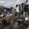 The remnants ofatent city in Rafah set alight by an Israeli airstrike, burning its inhabitants to death.