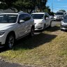 Cars parked on the footpath and kerb at Norman Park.