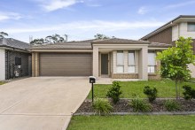 The home at 21 Coventry Lane in NSW Central Coast’s Hamlyn Terrace sold at auction for $780,000, $50,000 more than the identical neighbouring property sold for in November.