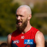 Max Gawn leads the Demons off the field after being thrashed by Fremantle.