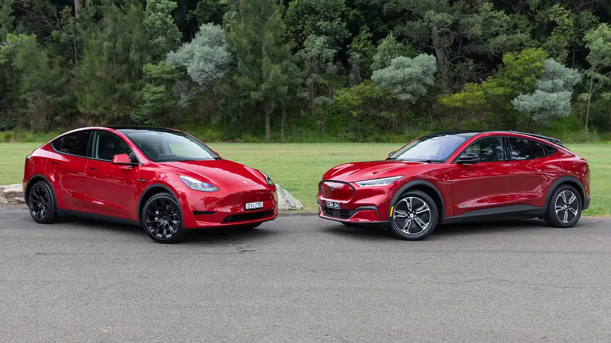 2024 Tesla Model Y vs Ford Mustang Mach-E electric SUV video comparison