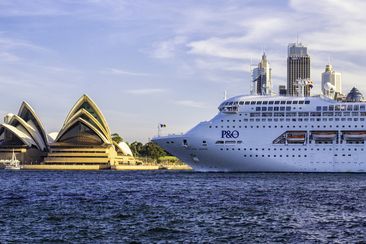 Sydney Australia - April 1, 2016: The P&amp;O cruise ship Pacific Jewel slowly steams past the Sydney Opera House on a bright Autumn afternoon.