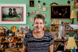 Destiny Deacon inside an NGV 2020 exhibition, with some of the “Koori kitsch” she was renowned for collecting.