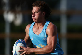 Mark Nawaqanitawase runs the ball during a Wallabies training session ahead of the Rugby World Cup.