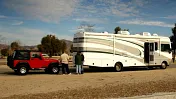 Does towing a car behind another car add kilometres to its odometer?