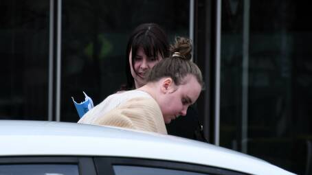 Shakira Adams gets into a car waiting outside court on Tuesday. Picture by Hannah Neale