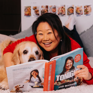 Nagi Maehashi with her dog Dozer and new book Tonight, which will be out on October 15.