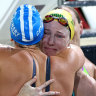 Cate Campbell is surrounded by her fellow competitors after swimming the final of the women’s 50m freestyle.