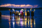 The group Wednesday Ocean Waders, or Wowsers, have their annual winter solstice celebration to mark the shortest day of the year, involving a lantern parade with handmade lanterns, a bagpipe playing and a dip in the ocean at Torquay beach.