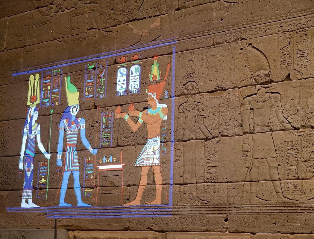 r/Damnthatsinteresting - This is what hieroglyphs and figures in ancient Egyptian temples looked like before their colors faded. They were recreated using a polychromatic light following thorough research