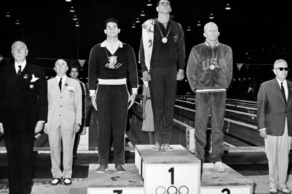 Australian John Devitt won gold in the 100 metres freestyle at the 1960 Rome Olympics in controversial circumstances, which led to a revolution in race timing systems.