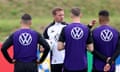 Julian Nagelsmann talks to some of his Germany players in training.