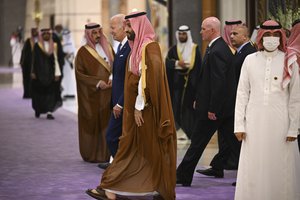 U.S. President Joe Biden, center behind, and Saudi Crown Prince Mohammed bin Salman, center front, arrive for the family photo