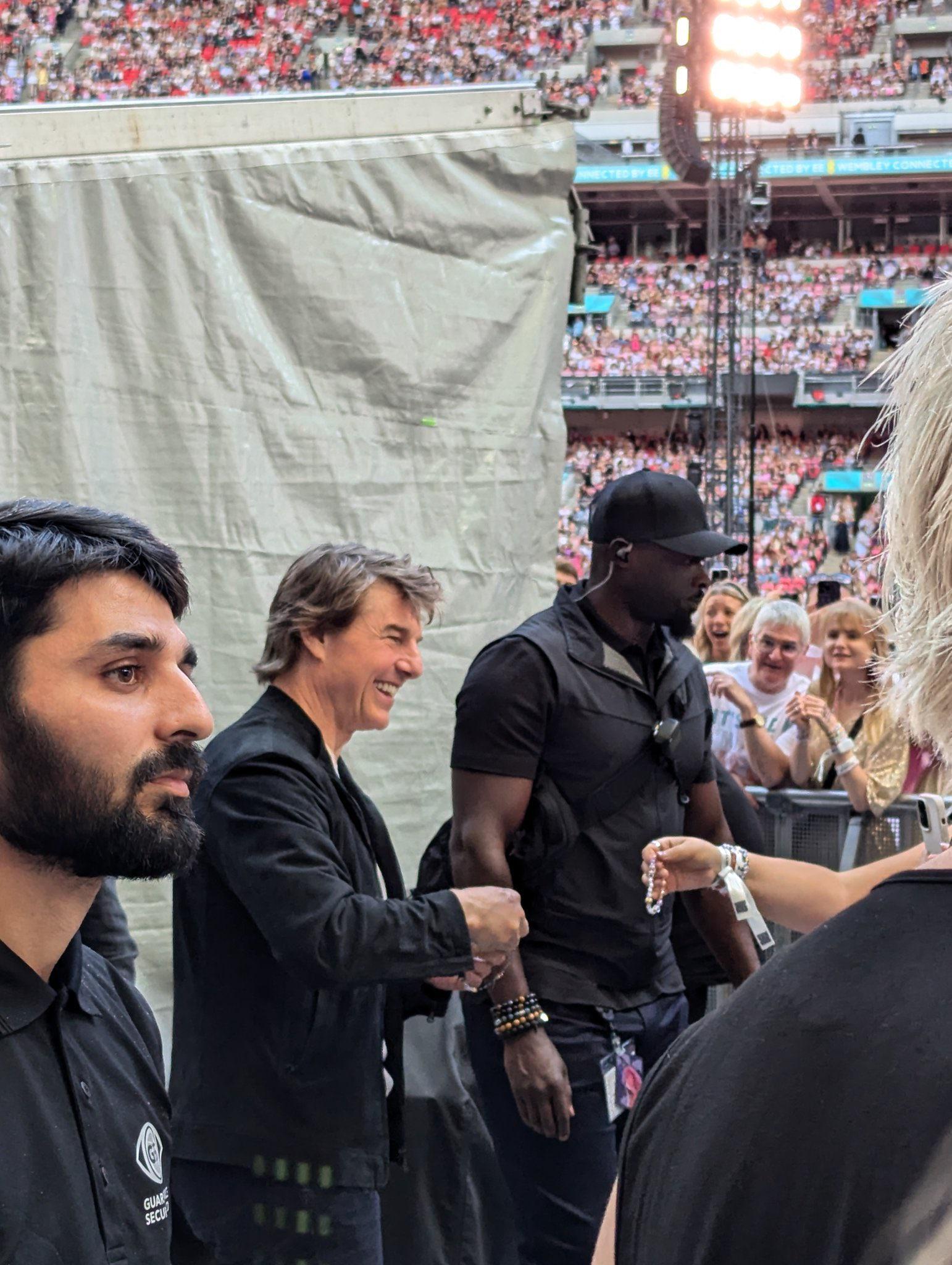 r/popculturechat - Tom Cruise exchanging friendship bracelets at Taylor Swift’s Eras Tour in London today