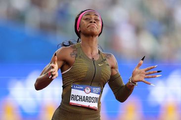 Sha&#x27;Carri Richardson reacts after winning the women&#x27;s 100 meter dash.