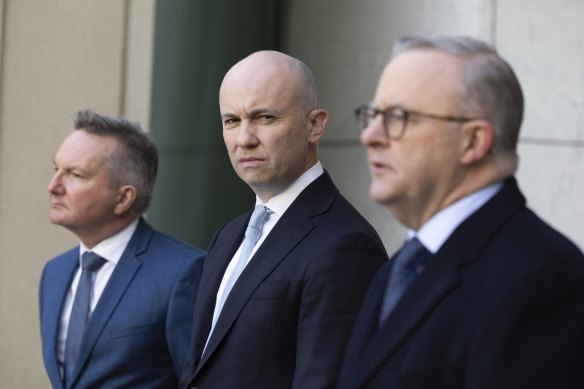 Chris Bowen, Matt Kean and Anthony Albanese at a press conference on Monday.