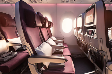 The inside of a Qatar Airways plane.