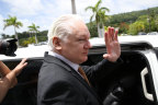 Julian Assange leaving the court in Saipan.