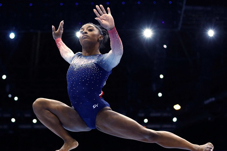 Simone Biles competes on the balance beam