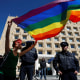 LGBT activist attends a rally against Homophobia and Transphobia in Tbilisi