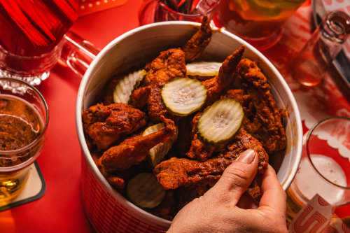 A bottomless bucket of hot wings at Belles.