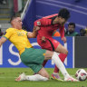 Lewis Miller fouls Son Heung-min in the Asian Cup quarter-final.