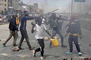 Protesters block Nairobi - Mombasa road highway in the Mlolongo area, Nairobi, Kenya Tuesday, July 2, 2024. Protests have continued to rock several towns in Kenya including the capital Nairobi, despite the president saying he will not sign a controversial finance bill that sparked deadly protests last week.