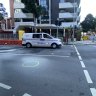 The crash site on Melbourne Street, just before the intersection with Cordelia Street.