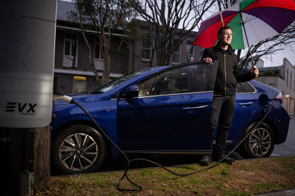 Eddy Blaxell does not have off-street parking at his rented home in Newtown, and only bought an electric vehicle once a public charger was installed on a power pole nearby.