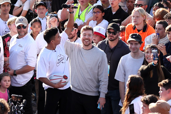 SYDNEY, AUSTRALIA - JUNE 26: Mr Beast, a.k.a Jimmy Donaldson performs with members of the crowd during the MrBeast Feastables launch at Sydney Opera House on June 26, 2024 in Sydney, Australia. (Photo by Brendon Thorne/Getty Images)