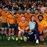 Wallabies pose for a team photo after their victory.