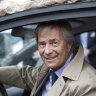 French billionaire Vincent Bollore behind the wheel of a customised electric car.