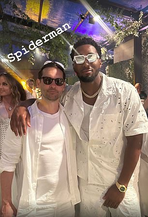 Donovan Mitchell of the Cleveland Cavaliers poses with Hollywood star Tobey Maguire