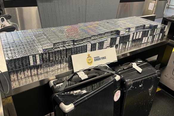 Japanese tourists have been caught trying to smuggle more than 300,000 cigarettes into Sydney - a haul totalling almost half a million dollars.