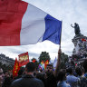 People gather at the Republique Plaza following the second round of French legislative elections.