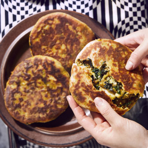 Filled flatbreads with kale and potato masala.