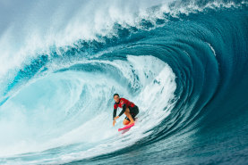 Wright in the thick of a Teahupo’o barrel during this year’s Tahiti Pro.